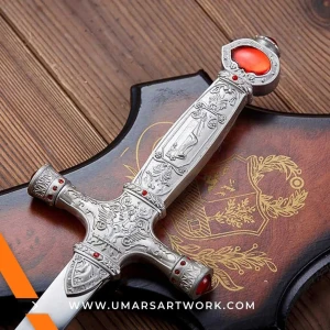 Gryffindor sword replica with ruby-studded hilt and silver blade, Iconic sword from the Harry Potter series, High-quality replica with detailed magical engravings, Fantasy sword of Godric Gryffindor with ornate guard, Display-worthy Gryffindor sword collectible for fans and wizards