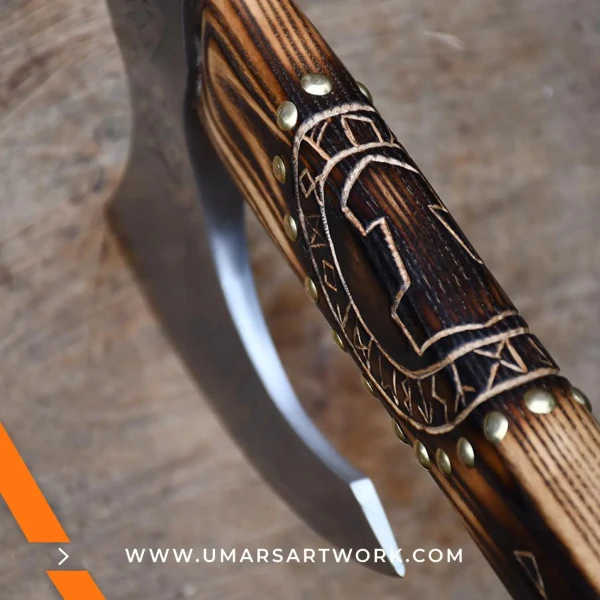 Carving axe replica with sharp, curved blade for detailed woodwork, Inspired by traditional woodworking tools, High-quality replica with forged steel head and hardwood handle, Designed for precision carving and shaping tasks, Display-worthy collectible combining function and craftsmanship