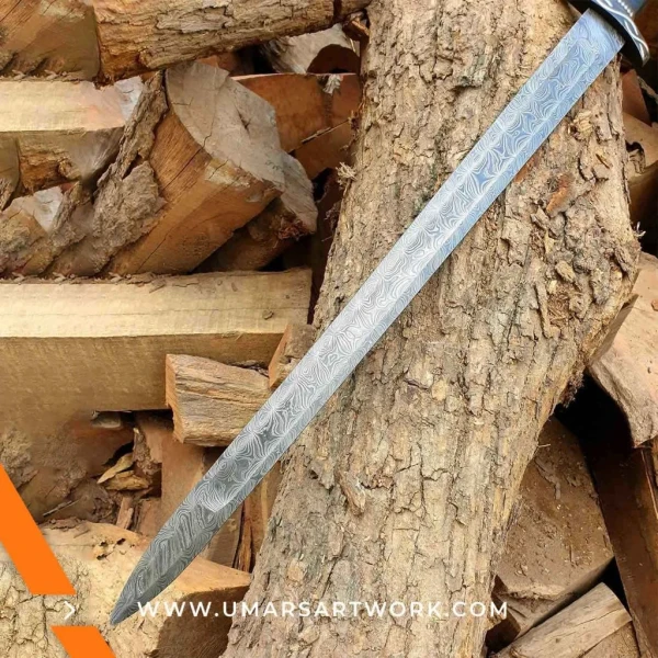 Damascus sword with distinctive wavy blade pattern and high-carbon steel, Hand-forged sword known for strength and sharpness, High-quality Damascus steel blade with elegant design, Functional sword with full-tang construction and durable grip, Display-worthy collectible showcasing traditional forging craftsmanship
