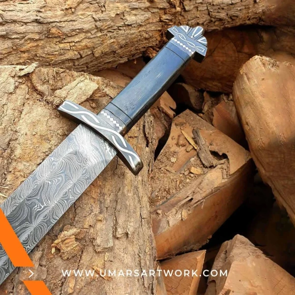 Damascus sword with distinctive wavy blade pattern and high-carbon steel, Hand-forged sword known for strength and sharpness, High-quality Damascus steel blade with elegant design, Functional sword with full-tang construction and durable grip, Display-worthy collectible showcasing traditional forging craftsmanship