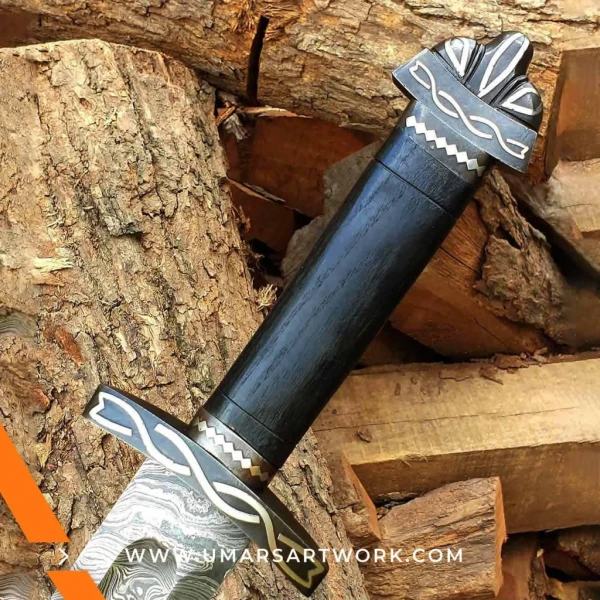Damascus sword with distinctive wavy blade pattern and high-carbon steel, Hand-forged sword known for strength and sharpness, High-quality Damascus steel blade with elegant design, Functional sword with full-tang construction and durable grip, Display-worthy collectible showcasing traditional forging craftsmanship