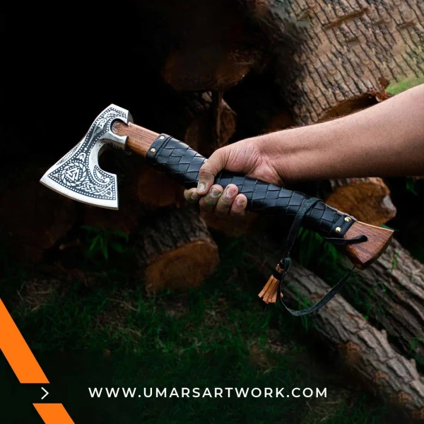 Viking axe with traditional Norse design and engraved steel head, Hand-forged blade inspired by ancient Viking warriors, High-quality axe with sturdy wooden handle for firm grip, Battle-ready replica ideal for display or functional use, Authentic Viking axe collectible with historical craftsmanship