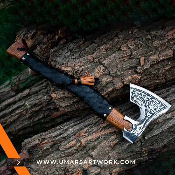 Viking axe with traditional Norse design and engraved steel head, Hand-forged blade inspired by ancient Viking warriors, High-quality axe with sturdy wooden handle for firm grip, Battle-ready replica ideal for display or functional use, Authentic Viking axe collectible with historical craftsmanship