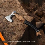 Viking axe with traditional Norse design and engraved steel head, Hand-forged blade inspired by ancient Viking warriors, High-quality axe with sturdy wooden handle for firm grip, Battle-ready replica ideal for display or functional use, Authentic Viking axe collectible with historical craftsmanship