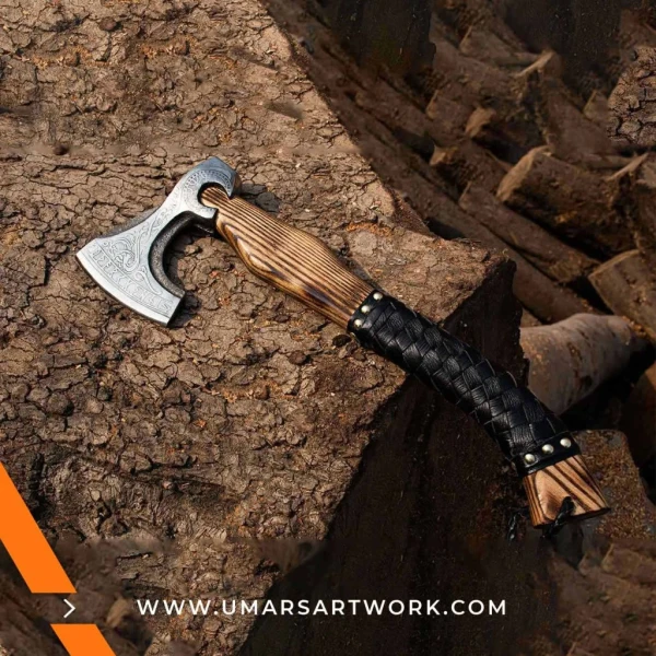 Viking axe with traditional Norse design and engraved steel head, Hand-forged blade inspired by ancient Viking warriors, High-quality axe with sturdy wooden handle for firm grip, Battle-ready replica ideal for display or functional use, Authentic Viking axe collectible with historical craftsmanship