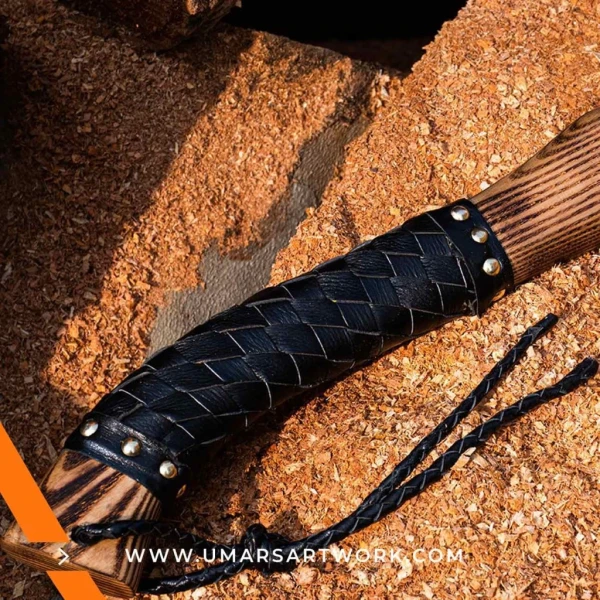 Viking axe with traditional Norse design and engraved steel head, Hand-forged blade inspired by ancient Viking warriors, High-quality axe with sturdy wooden handle for firm grip, Battle-ready replica ideal for display or functional use, Authentic Viking axe collectible with historical craftsmanship