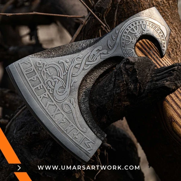 Viking axe with traditional Norse design and engraved steel head, Hand-forged blade inspired by ancient Viking warriors, High-quality axe with sturdy wooden handle for firm grip, Battle-ready replica ideal for display or functional use, Authentic Viking axe collectible with historical craftsmanship