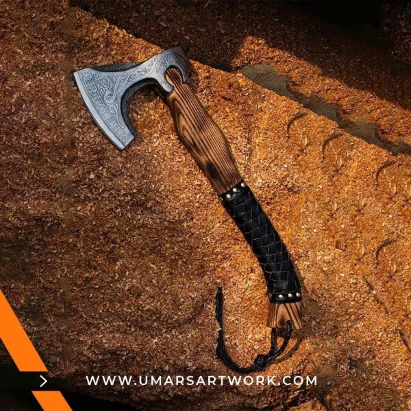Viking axe with traditional Norse design and engraved steel head, Hand-forged blade inspired by ancient Viking warriors, High-quality axe with sturdy wooden handle for firm grip, Battle-ready replica ideal for display or functional use, Authentic Viking axe collectible with historical craftsmanship