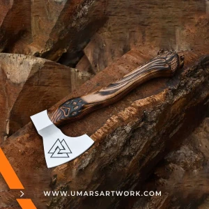Viking axe with traditional Norse design and engraved steel head, Hand-forged blade inspired by ancient Viking warriors, High-quality axe with sturdy wooden handle for firm grip, Battle-ready replica ideal for display or functional use, Authentic Viking axe collectible with historical craftsmanship