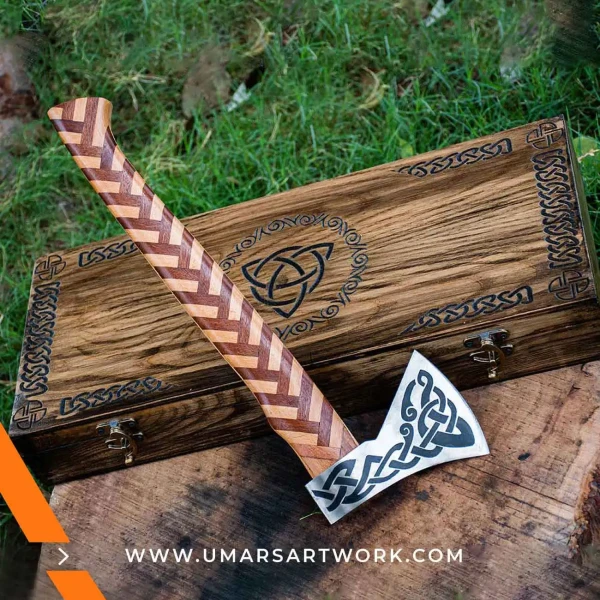 Viking axe with traditional Norse design and engraved steel head, Hand-forged blade inspired by ancient Viking warriors, High-quality axe with sturdy wooden handle for firm grip, Battle-ready replica ideal for display or functional use, Authentic Viking axe collectible with historical craftsmanship