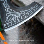 Viking axe with traditional Norse design and engraved steel head, Hand-forged blade inspired by ancient Viking warriors, High-quality axe with sturdy wooden handle for firm grip, Battle-ready replica ideal for display or functional use, Authentic Viking axe collectible with historical craftsmanship