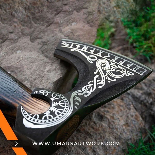 Viking axe with traditional Norse design and engraved steel head, Hand-forged blade inspired by ancient Viking warriors, High-quality axe with sturdy wooden handle for firm grip, Battle-ready replica ideal for display or functional use, Authentic Viking axe collectible with historical craftsmanship