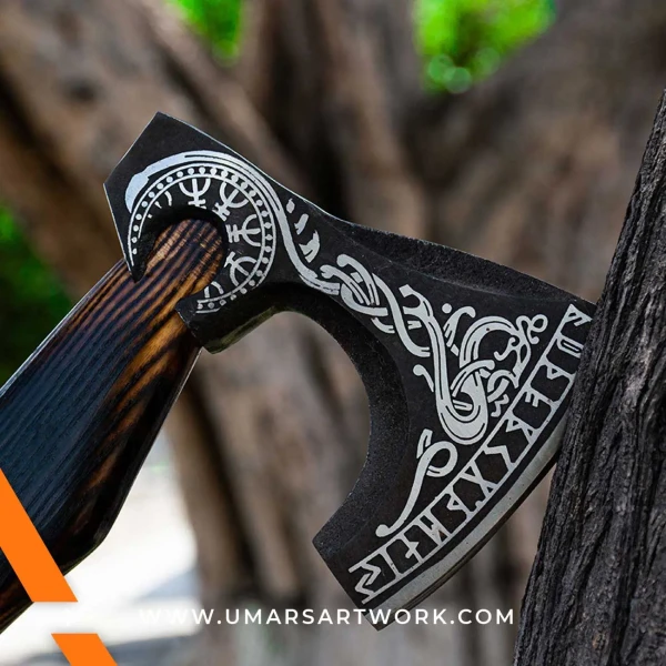 Viking axe with traditional Norse design and engraved steel head, Hand-forged blade inspired by ancient Viking warriors, High-quality axe with sturdy wooden handle for firm grip, Battle-ready replica ideal for display or functional use, Authentic Viking axe collectible with historical craftsmanship