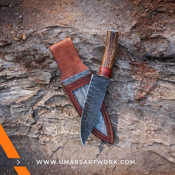 Heavy-duty hunting knife with drop-point blade