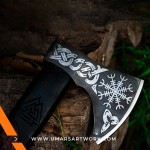 Ornate Viking axe blade and handle