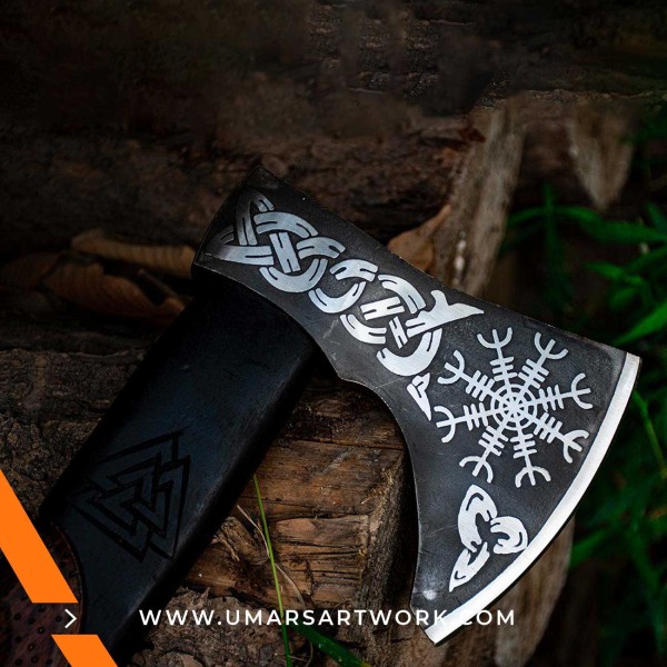 Ornate Viking axe blade and handle