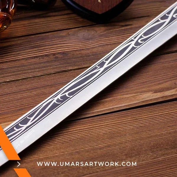 Elvenking LOTR replica sword with elegant curved blade, Sword inspired by Thranduil from The Hobbit series, High-quality Elvenking sword with leaf-like engravings, Fantasy replica with Elven-style hilt and gold accents, Display-worthy sword collectible with intricate Elvish design
