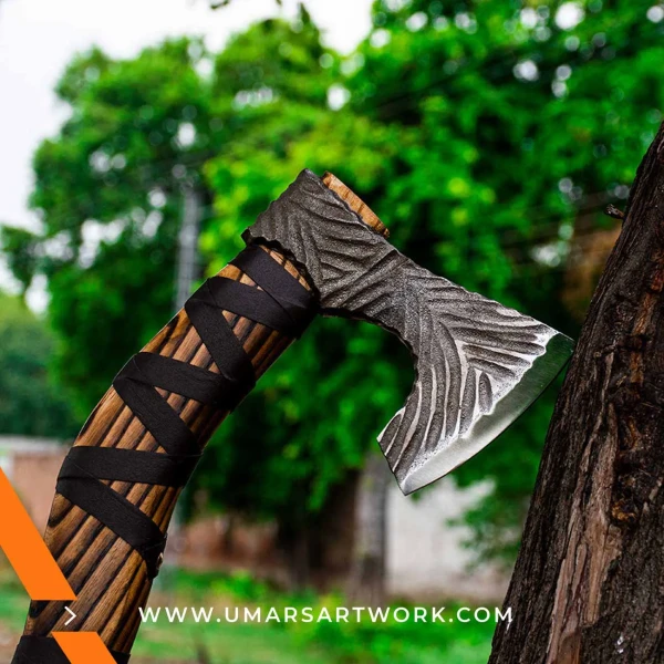 Viking axe with traditional Norse design and engraved steel head, Hand-forged blade inspired by ancient Viking warriors, High-quality axe with sturdy wooden handle for firm grip, Battle-ready replica ideal for display or functional use, Authentic Viking axe collectible with historical craftsmanship