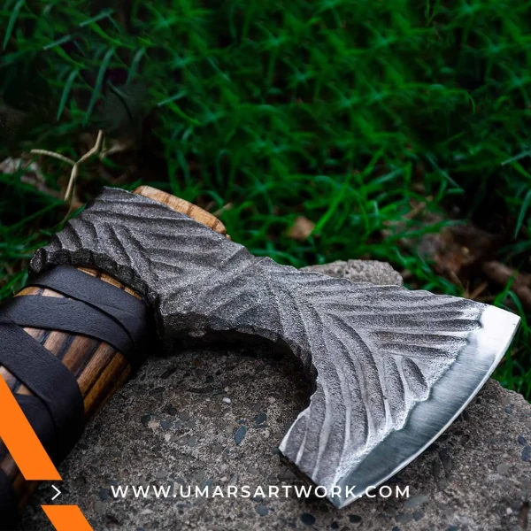 Viking axe with traditional Norse design and engraved steel head, Hand-forged blade inspired by ancient Viking warriors, High-quality axe with sturdy wooden handle for firm grip, Battle-ready replica ideal for display or functional use, Authentic Viking axe collectible with historical craftsmanship