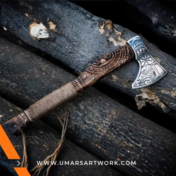 Viking axe with traditional Norse design and engraved steel head, Hand-forged blade inspired by ancient Viking warriors, High-quality axe with sturdy wooden handle for firm grip, Battle-ready replica ideal for display or functional use, Authentic Viking axe collectible with historical craftsmanship