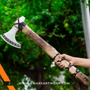 Viking axe with traditional Norse design and engraved steel head, Hand-forged blade inspired by ancient Viking warriors, High-quality axe with sturdy wooden handle for firm grip, Battle-ready replica ideal for display or functional use, Authentic Viking axe collectible with historical craftsmanship