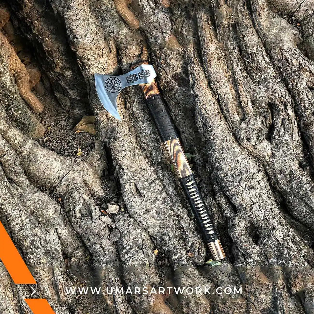 Viking axe with traditional Norse design and engraved steel head, Hand-forged blade inspired by ancient Viking warriors, High-quality axe with sturdy wooden handle for firm grip, Battle-ready replica ideal for display or functional use, Authentic Viking axe collectible with historical craftsmanship